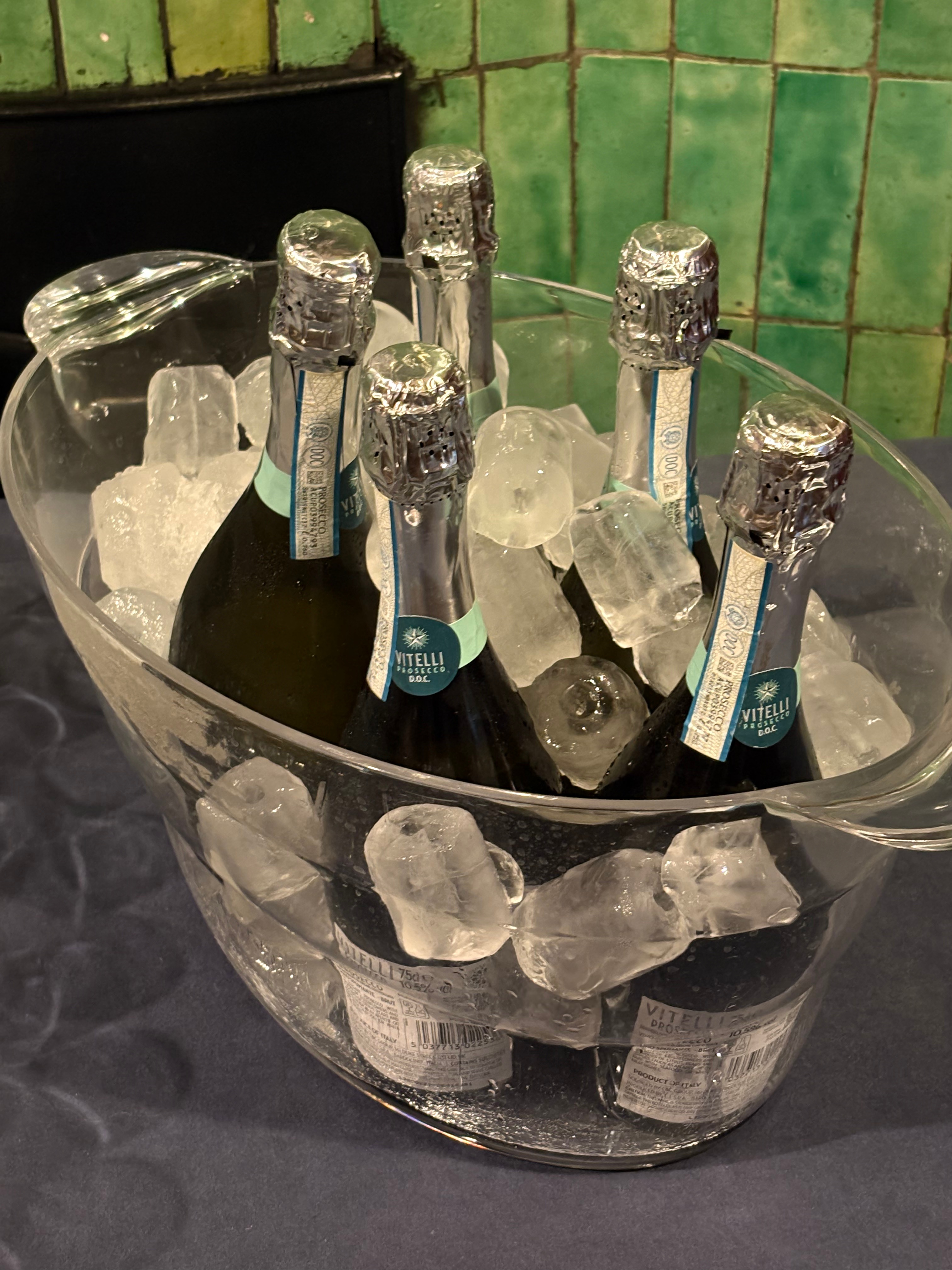 Bottles of prosecco on ice